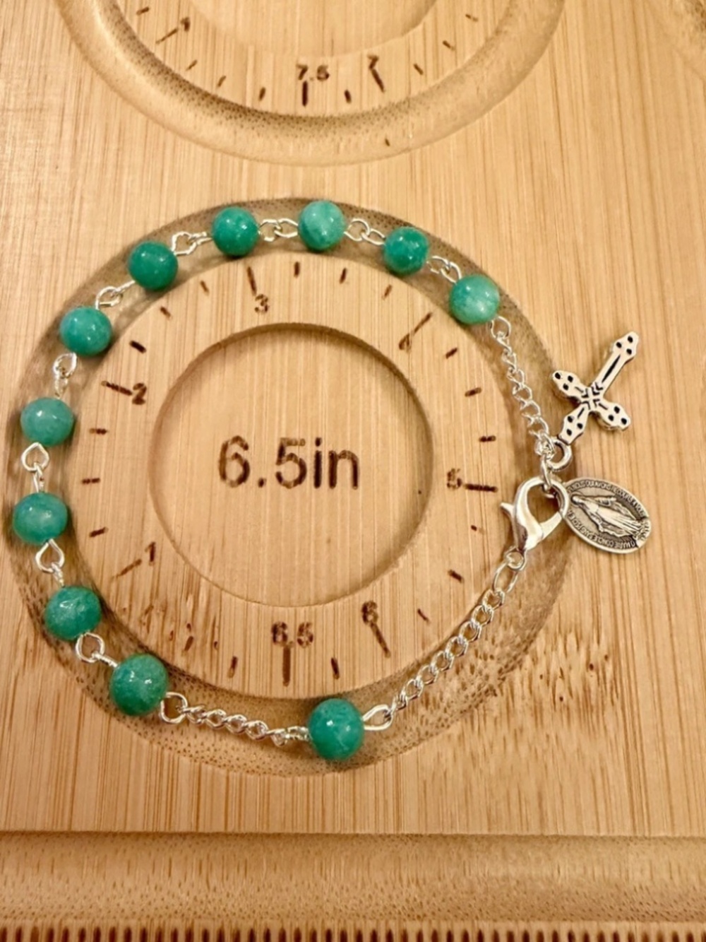 Rosary bracelets with Miraculous Medal charm obtained from the Chapel in Paris